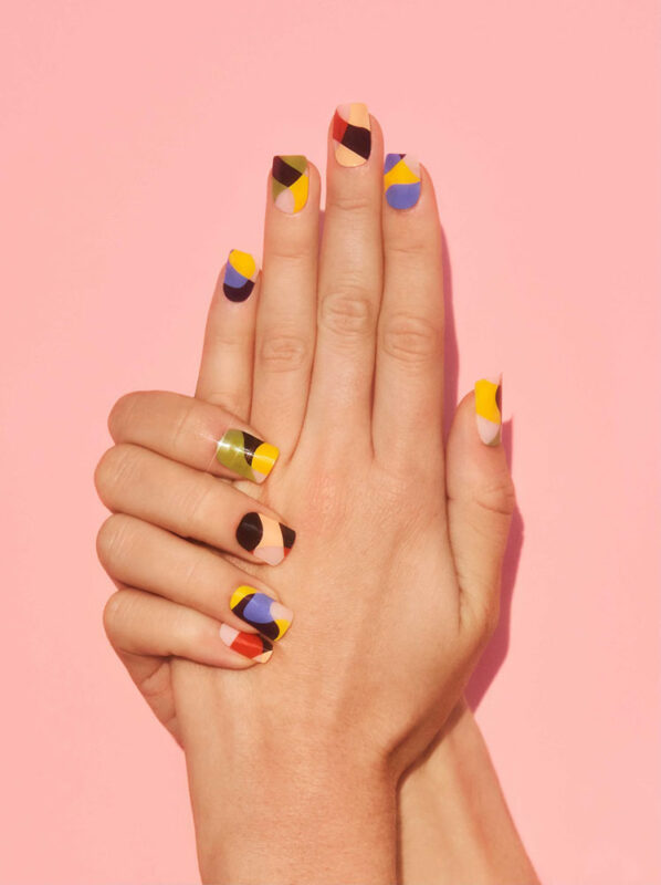 Hands with multi colored nails